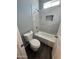 Updated bathroom with tub, shower, and modern tile at 4022 S 24Th Pl, Phoenix, AZ 85040