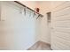 Walk-in closet with built-in shelves and hanging rods at 4115 E Haley Dr, San Tan Valley, AZ 85143