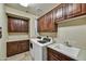 Laundry room with washer, dryer, and ample cabinetry at 4367 S Avenida De Angeles --, Gold Canyon, AZ 85118