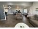 Bright and airy living room with hardwood floors and comfortable seating at 451 N 68Th Ln # 168, Phoenix, AZ 85043