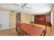 Bright dining room with hardwood floors and built-in hutch at 5446 W Beryl Ave, Glendale, AZ 85302