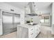 Modern kitchen with stainless steel appliances and marble island at 5679 E Beverly Ln, Scottsdale, AZ 85254