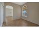 Bright dining area with tile floors and built-in cabinetry at 6520 W Oraibi Dr, Glendale, AZ 85308