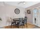 Small dining area with dark wood table and four chairs at 6623 S Palm Dr, Tempe, AZ 85283