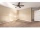 Spacious bedroom with ceiling fan and neutral carpeting at 6742 N 11Th St, Phoenix, AZ 85014