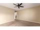 Bedroom featuring ceiling fan and access to bathroom at 6742 N 11Th St, Phoenix, AZ 85014