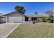 Single-story house with a well-maintained lawn and attached garage at 7722 N 47Th Dr, Glendale, AZ 85301