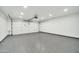 Clean and spacious garage with epoxy flooring and overhead storage at 7823 N Via Del Mundo --, Scottsdale, AZ 85258