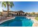 Inviting kidney-shaped pool with a surrounding brick patio at 9627 N 26Th Pl, Phoenix, AZ 85028