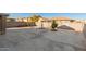 Large backyard area with a fountain and trees at 990 E Doris St, Avondale, AZ 85323