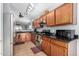 Full view of kitchen with stainless steel appliances and granite countertops at 10158 E Caballero St, Mesa, AZ 85207