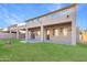 Spacious backyard with covered patio and fire pit at 12006 W Vernon Ave, Avondale, AZ 85392