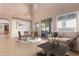 Casual dining area with adjacent sitting area and access to backyard at 12006 W Vernon Ave, Avondale, AZ 85392