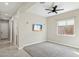 Bright bedroom with carpet flooring and ceiling fan at 12860 W Calle De Sol --, Peoria, AZ 85383