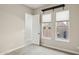 Bedroom with window, built-in desk, and closet at 12860 W Calle De Sol --, Peoria, AZ 85383