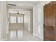 Bright entryway with tile flooring and plantation shutters at 12860 W Calle De Sol --, Peoria, AZ 85383