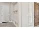 Entryway with bench, cubbies, and hooks at 12860 W Calle De Sol --, Peoria, AZ 85383