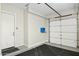 Garage with door and floor mats at 12860 W Calle De Sol --, Peoria, AZ 85383