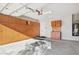 Garage with storage cabinets and water heater at 12860 W Calle De Sol --, Peoria, AZ 85383