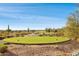 Landscaped golf course with desert plants at 12860 W Calle De Sol --, Peoria, AZ 85383