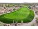 Aerial view of a lush green golf course at 12860 W Calle De Sol --, Peoria, AZ 85383