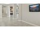 Open hallway with views into the living room at 12860 W Calle De Sol --, Peoria, AZ 85383