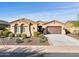 Single story home with attractive landscaping and a two-car garage at 12860 W Calle De Sol --, Peoria, AZ 85383