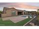Backyard view of home with pool, patio, and landscaping at 12860 W Calle De Sol --, Peoria, AZ 85383