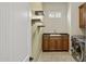 Laundry room with washer, dryer, and cabinets at 12860 W Calle De Sol --, Peoria, AZ 85383