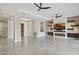 Spacious living room featuring a fireplace and built-in entertainment center at 12860 W Calle De Sol --, Peoria, AZ 85383