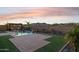 Inviting backyard with a sparkling pool, pergola, and mountain views at 12860 W Calle De Sol --, Peoria, AZ 85383