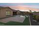 Relaxing backyard with a refreshing pool, pergola, and patio at 12860 W Calle De Sol --, Peoria, AZ 85383