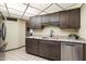 Updated kitchen, featuring stainless steel appliances and granite counters at 13844 N 111Th Ave, Sun City, AZ 85351