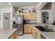 Modern kitchen with stainless steel appliances and ample counter space at 15773 W La Reata Ave, Goodyear, AZ 85395