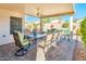 Covered patio with seating area, perfect for outdoor dining at 16232 W Silver Falls Dr, Surprise, AZ 85374