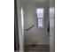 Small bathroom with a window and grab bar at 17200 W Bell Rd # 1015, Surprise, AZ 85374