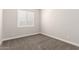 Simple bedroom with window shutters and carpet at 21168 W Windsor Ave, Buckeye, AZ 85396