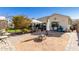 Entertaining backyard with fire pit and patio at 4396 E Austin Ln, San Tan Valley, AZ 85140