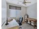 Home office with desk, chair, and built-in shelving at 4741 E Timberline Rd, Gilbert, AZ 85297