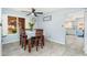 Cozy dining area with a wooden table and chairs, near the kitchen at 5252 W Garden Dr, Glendale, AZ 85304