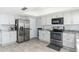 Updated kitchen, featuring stainless steel appliances and granite countertops at 5252 W Garden Dr, Glendale, AZ 85304