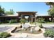Attractive community entrance with fountain and landscaping at 7009 E Acoma Dr # 1105, Scottsdale, AZ 85254