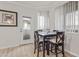 Cozy dining area with table and chairs, near access to balcony at 7009 E Acoma Dr # 1105, Scottsdale, AZ 85254