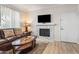 Living room with a fireplace and comfortable seating at 7009 E Acoma Dr # 1105, Scottsdale, AZ 85254