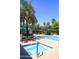 Inviting pool and spa area with comfortable seating and landscaping at 7009 E Acoma Dr # 1105, Scottsdale, AZ 85254