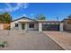 Updated single-story home with a neutral color palette, attached garage, and drought-tolerant landscaping at 7757 N 18Th Ave, Phoenix, AZ 85021