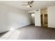 Bright bedroom with ceiling fan and mirrored closet doors at 818 S Westwood -- # 124, Mesa, AZ 85210