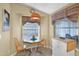 Cozy breakfast nook with window seating and small table at 8500 E Southern Ave # 368, Mesa, AZ 85209