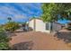 Side yard view showing exterior of the house and landscaping at 8500 E Southern Ave # 368, Mesa, AZ 85209
