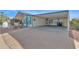 Exterior view of a home with a carport and a paved driveway at 8500 E Southern Ave # 368, Mesa, AZ 85209